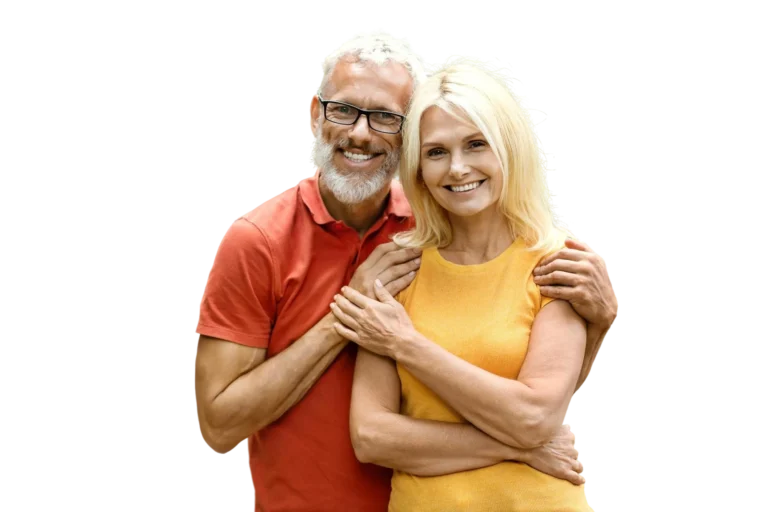 Senior couple relaxing together on couch enjoying peaceful home environment